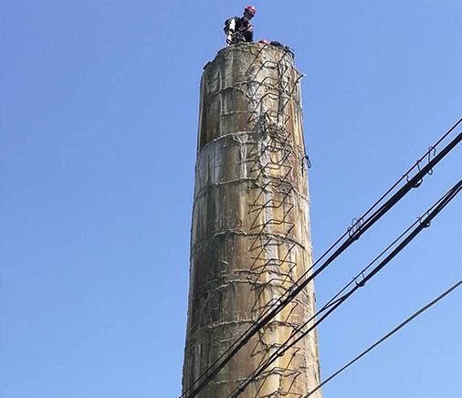 无锡烟囱拆除前根据周围环境安全防护搭设